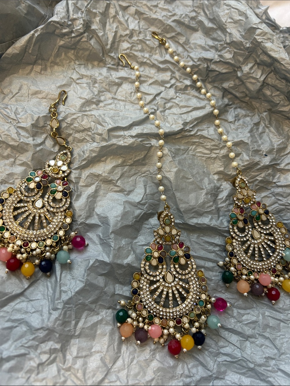 Earings multi color and head tika extra long earing with beads. Pre owned